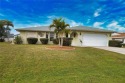 Welcome to this charming 2-bedroom, 2-bathroom home with a 2-car for sale in Englewood Florida Charlotte County County on GolfHomes.com