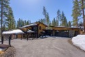 With two main level primary suites and an expansive outdoor for sale in Truckee California Nevada County County on GolfHomes.com