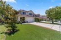Turquoise double doors welcome you to this cheery 2 story for sale in Simi Valley California Ventura County County on GolfHomes.com