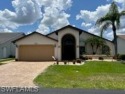Enjoy spectacular sunset views with beautiful landscaping for sale in North Fort Myers Florida Lee County County on GolfHomes.com