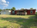Gorgeous Oak Creek manufactured hm. 4 bedrm 2 bath on 1 acre for sale in Yantis Texas Wood County County on GolfHomes.com