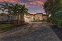 Come see this beautiful custom home in the cherished Legends Bay for sale in Bradenton Florida Manatee County County on GolfHomes.com