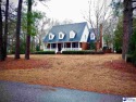 Charming Lakefront Property on Lake Bennett, nestled in the for sale in Florence South Carolina Florence County County on GolfHomes.com