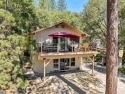 Cabin completely remodeled, with luxury vinyl plank flooring for sale in Groveland California Tuolumne County County on GolfHomes.com