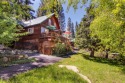 Located in sought-after Prosser Lakeview Estates, this charming for sale in Truckee California Nevada County County on GolfHomes.com