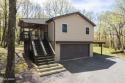 Welcome to your dream home nestled on a picturesque level lot for sale in Greentown Pennsylvania Pike County County on GolfHomes.com