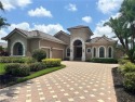 Welcome to this beautiful award winning Welch courtyard custom for sale in Fort Myers Florida Lee County County on GolfHomes.com