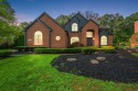 Discover unparalleled elegance in this brick colonial nestled for sale in Commerce Twp Michigan Oakland County County on GolfHomes.com