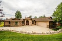 Discover luxury living in this impeccable home located in the for sale in Sheridan Wyoming Sheridan County County on GolfHomes.com