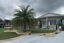 HOT TUB on large rear patio on the GOLF COURSE Located on a for sale in Brooksville Florida Hernando County County on GolfHomes.com