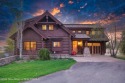 This beautiful, rustic log home is nestled amidst the aspens and for sale in Victor Idaho Teton County County on GolfHomes.com