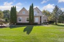 Nestled in the heart of the prestigious Prestwick Village Golf for sale in Highland Michigan Oakland County County on GolfHomes.com