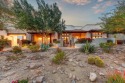 Welcome to this impeccably maintained southwest inspired custom for sale in Gold Canyon Arizona Pinal County County on GolfHomes.com
