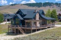 Stunning custom home was completed in 2022 sits on the first for sale in Granby Colorado Grand County County on GolfHomes.com