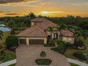 Discover refined Florida living in this custom-designed for sale in Venice Florida Sarasota County County on GolfHomes.com