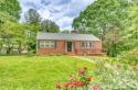 Discover the potential of this charming 3-bedroom, 1-bathroom for sale in Asheville North Carolina Buncombe County County on GolfHomes.com