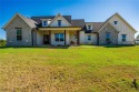 This beautifully designed home offers a private entrance to the, Texas