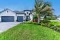 This stunning home boasts contemporary, elegant designer for sale in Naples Florida Collier County County on GolfHomes.com
