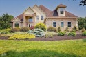 Custom built one and a half story home over a walkout basement for sale in Bloomington Indiana Monroe County County on GolfHomes.com