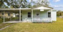 Welcome HOME! This charming 3-bedroom, 2-bathroom single-family for sale in Tampa Florida Hillsborough County County on GolfHomes.com