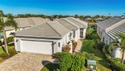 Maintenance-Free Patio Home with Lake View in St. Andrews East for sale in Venice Florida Sarasota County County on GolfHomes.com