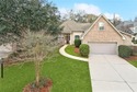 Welcome to 432 Marina Oaks Drive, located inside the gated for sale in Mandeville Louisiana St. Tammany Parish County on GolfHomes.com