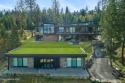 This Custom Home located at the end of a cul de sac at Gozzer for sale in Harrison Idaho Kootenai County County on GolfHomes.com