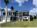 Beautiful 2 story home on the golf course with canal in back for sale in Fort Myers Florida Lee County County on GolfHomes.com