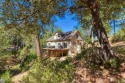 Beautiful contemporary home on a private .69-acre lot, great for sale in Groveland California Tuolumne County County on GolfHomes.com