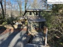 This home offers 2 bedrooms, 2 full baths, large deck for for sale in Newland North Carolina Avery County County on GolfHomes.com