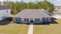 This immaculate custom-built four-bedroom, two plus half bath for sale in Gulf Shores Alabama Baldwin County County on GolfHomes.com