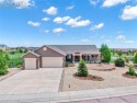 Welcome to this stunning residence situated on a 1.32-acre lot for sale in Peyton Colorado El Paso County County on GolfHomes.com