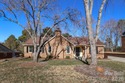 Handsome Raintree one level home that is almost full brick for sale in Charlotte North Carolina Mecklenburg County County on GolfHomes.com