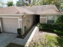 Welcome to this cozy 2-bedroom, 2-bathroom villa in the Lake for sale in Zephyrhills Florida Pasco County County on GolfHomes.com