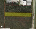 Almost 5 acres of agricultural land features prime road footage for sale in Naples Florida Collier County County on GolfHomes.com