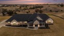 Discover luxury living in this gorgeous 4-bedroom, 4-bathroom for sale in Weatherford Texas Parker County County on GolfHomes.com