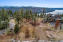 Elevated, level buildable lot at Gozzer Ranch Golf & Lake Club for sale in Harrison Idaho Kootenai County County on GolfHomes.com