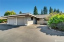 Embrace easy living in this beautifully refreshed 2BD 1.75BA for sale in Tacoma Washington Pierce County County on GolfHomes.com