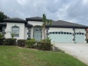WHAT AN ABSOLUTE STUNNER DIRECTLY ON ONE OF THE AREAS BEST for sale in Trinity Florida Pasco County County on GolfHomes.com