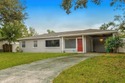 Under contract-accepting backup offers. Fore! This mid-century for sale in Tampa Florida Hillsborough County County on GolfHomes.com