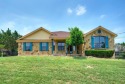 This well maintained home features a light, bright and open for sale in Spicewood Texas Travis County County on GolfHomes.com