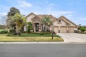 Discover this stunning luxury pool home in the gated golf for sale in Dunnellon Florida Marion County County on GolfHomes.com