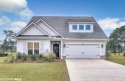 STUNNING GOLD-FORTIFIED HOME!!! This home boasts GOLF COURSE and for sale in Gulf Shores Alabama Baldwin County County on GolfHomes.com