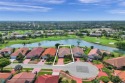 Nestled in the heart of Boca Woods Country Club, renovated two for sale in Boca Raton Florida Palm Beach County County on GolfHomes.com