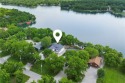 ABSOLUTELY GORGEOUS RANCH ON THE LAKE WITH FLOATING DOCK!!! Best for sale in Linn Valley Kansas Linn County County on GolfHomes.com