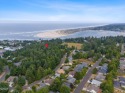 Prime 6.96 Acres of Residential Land with Ocean Views. Discover for sale in Waldport Oregon Lincoln County County on GolfHomes.com