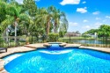 Welcome to lakefront luxury living in the esteemed Seminole Lake for sale in Seminole Florida Pinellas County County on GolfHomes.com