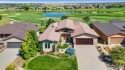 This luxury home in Highland Meadows will take your breath away for sale in Windsor Colorado Larimer County County on GolfHomes.com