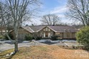 Welcome to the highly sought-after Raintree neighborhood for sale in Charlotte North Carolina Mecklenburg County County on GolfHomes.com