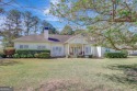 Your Private Golf Course Retreat Awaits! Nestled on an expansive for sale in Newnan Georgia Coweta County County on GolfHomes.com